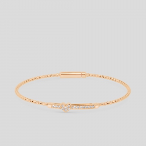 Foto Bracciale semirigido in oro rosa con diamanti