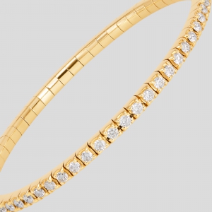 Foto Bracciale tennis elastico in oro giallo e diamanti